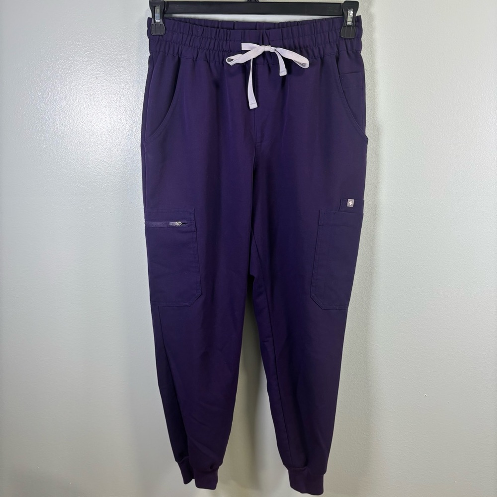 Figs Women's Track Joggers in Deep Purple with White Drawstring